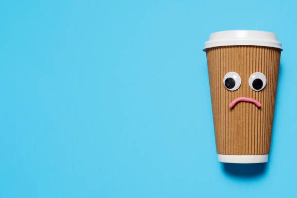 istock Sad disposable coffee cup on the right 1216252492
