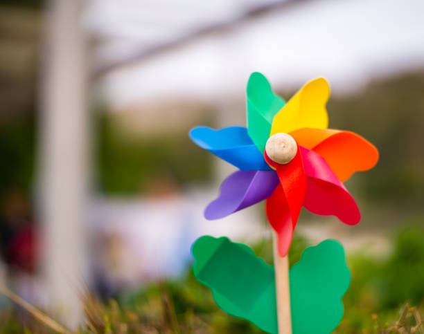 istock Rainbow Colored Pinwheel closeup at Park 1216253440