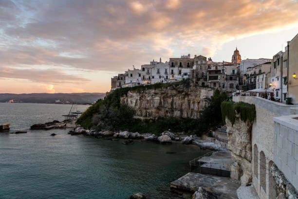istock city on rock above the sea 1216254027