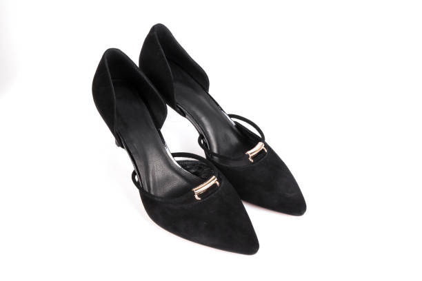 istock women's shoes on a white background isolated. Copy space text. 1216255252