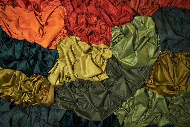 istock Abstract composition of plain fabrics of various colors. Background, abstraction 1216255506