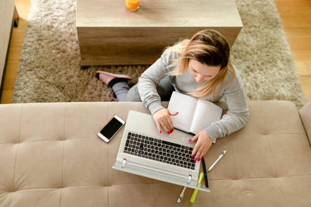 istock Attractive young woman working from home 1216257570