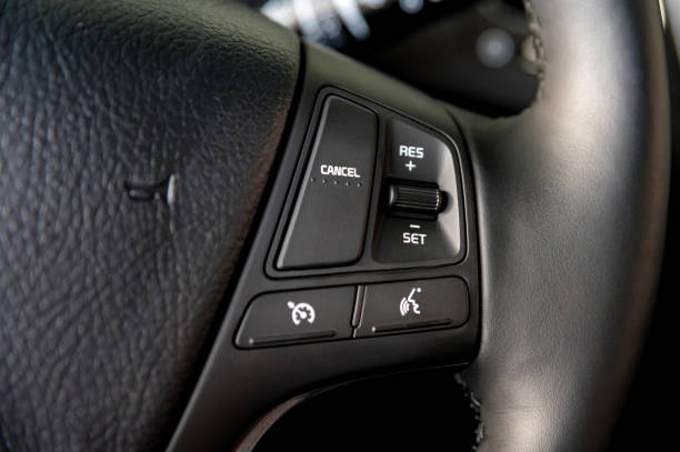 istock Cruise control unit in the new car close 1216259886