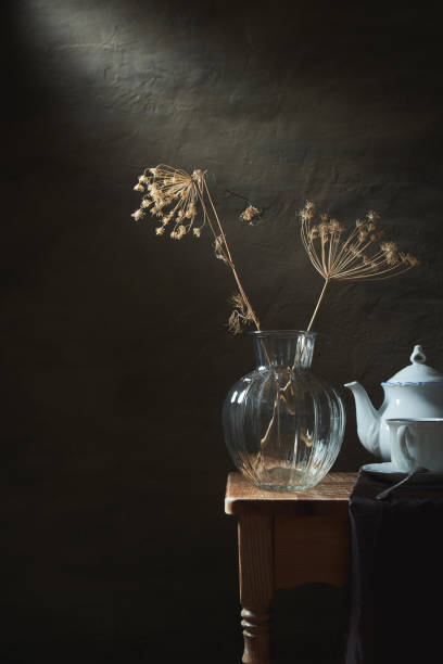 istock Still life with dry plants in a glass vase 1216261089