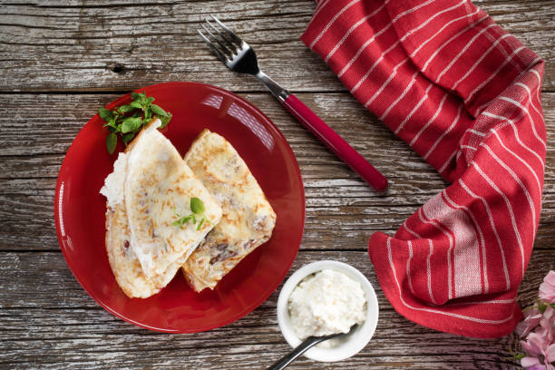istock Crepes with ricotta cheese and blackcurrant jam. 1216261867