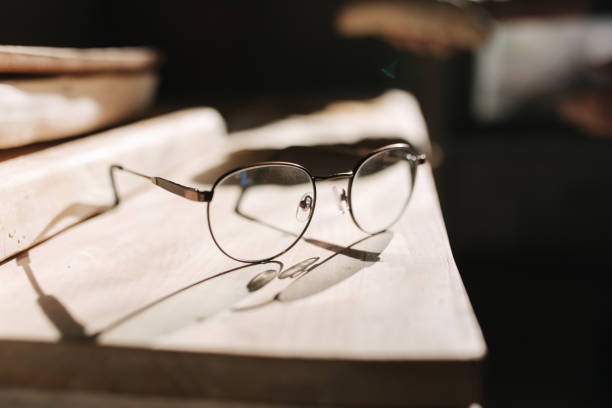 istock Glasses on the table in workshop. Sunset 1216261958