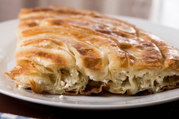 istock Closeup macro of balkan burek with cheese on the plate 1216262212