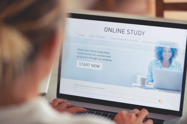 Person working on an online study website. Person working on an online study website. The website has an image of a woman and links to different e-learning education facilities for home schooling homeschooling photos stock pictures, royalty-free photos & images