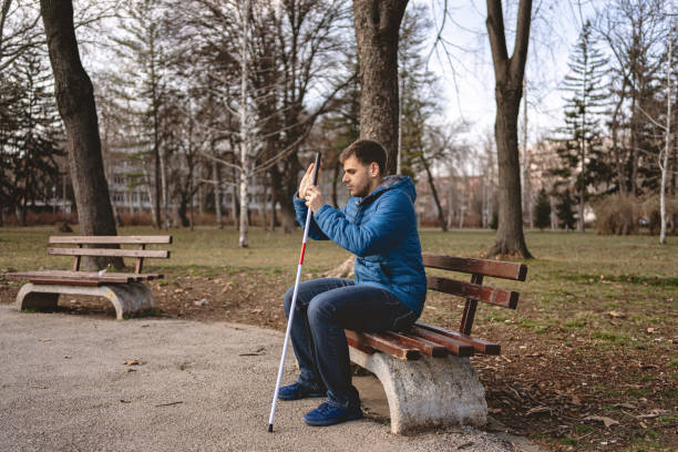 istock Blind man enjoying a relaxing morning on a bench 1216271479