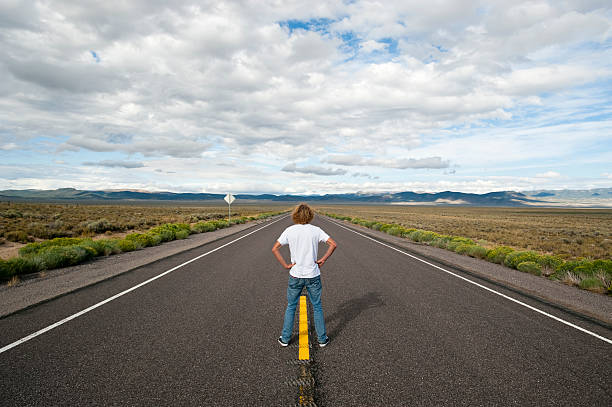 istock Young man on the Road 121627533