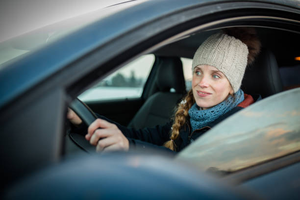 istock Woman driving a car 1216275702