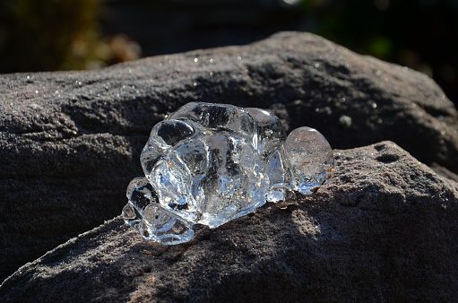 Interesting formation of ice on a rock