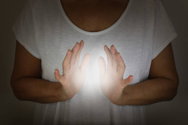 istock Healer demonstrating how to sense the human electromagnetic with hands 1216278326