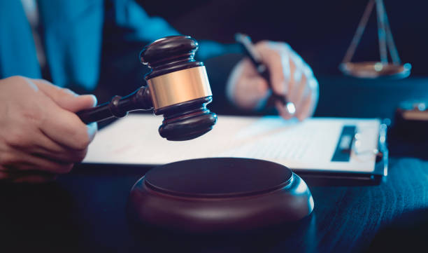 istock Lawyer, attorney with gavel at work. Law concept 1216278329