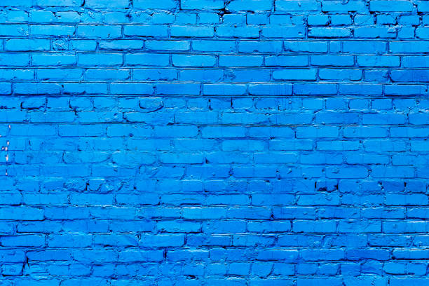istock Old blue painted brick wall texture or background. High contrast and resolution image with place for text. Template for design 1216278392
