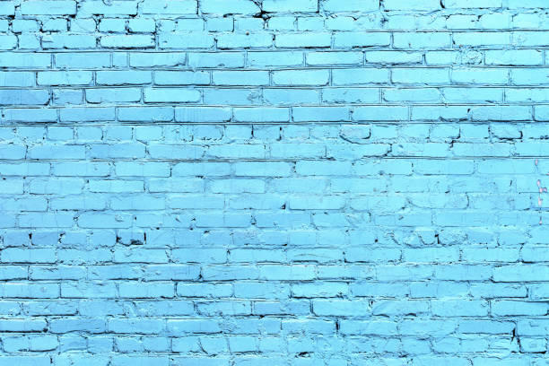 istock Old blue painted brick wall texture or background. High contrast and resolution image with place for text. Template for design 1216278405