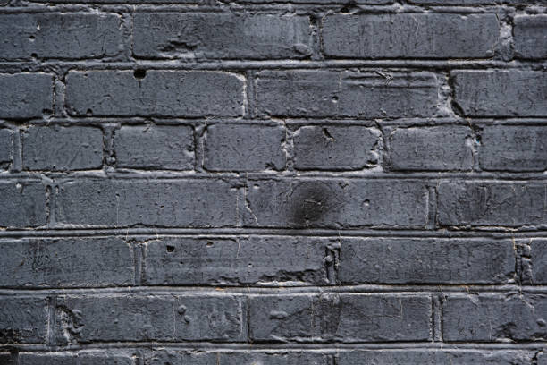 istock Old grey painted brick wall texture or background. High contrast and resolution image with place for text. Template for design 1216278466