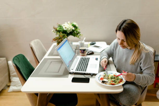 istock Young woman having a lunch 1216279646