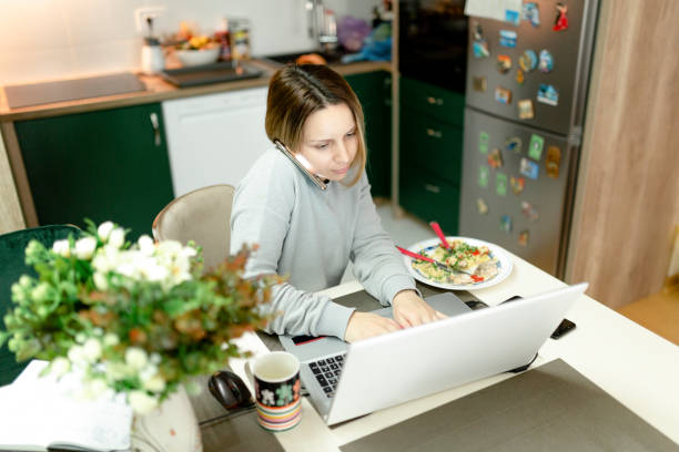 istock Attractive woman working from home 1216279672