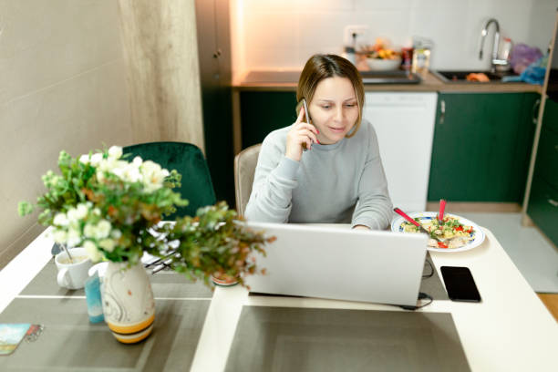istock Attractive woman working from home 1216279712