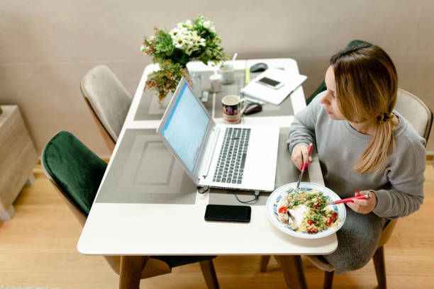 istock Young woman having a lunch 1216279724