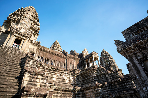 View of the East Mebon, a 10th Century temple at Angkor, Cambodia. Built during the reign of King Rajendravarman, it stands on what was an artificial island at the center of the now dry East Baray reservoir.