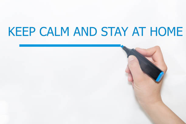 istock The word KEEP CALM AND STAY AT HOME 1216282416