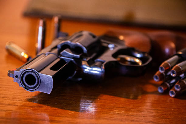 istock Revolver with Bullets 1216284999