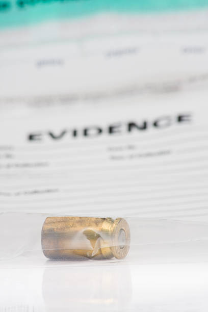 Evidence bag Transparent evidence bag with bullet casing on white background evidence-bag-forensic-science-bag-label stock pictures, royalty-free photos & images