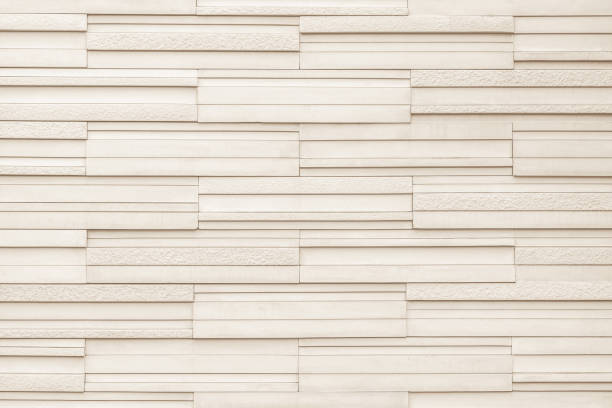 istock Granite tiled wall detailed pattern texture background in natural light beige brown 1216291177