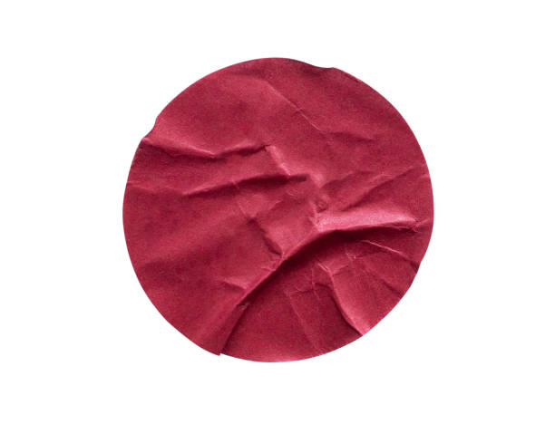istock Blank red round adhesive paper sticker label isolated on white background 1216291204