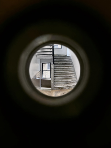 Looking through peephole in an apartment