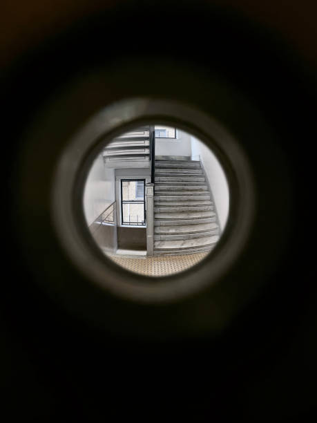 peephole Looking through peephole in an apartment peep hole stock pictures, royalty-free photos & images