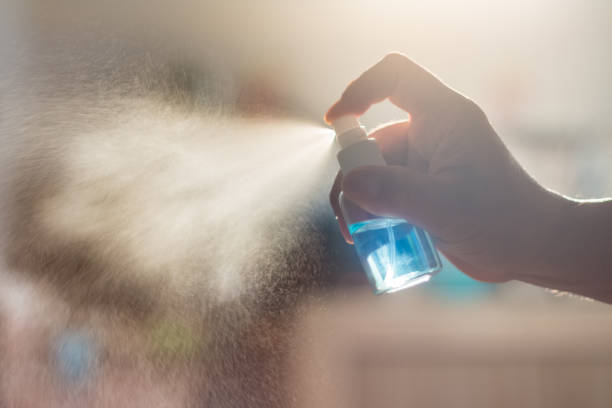 istock sanitizer alcohol in man hand 1216294241