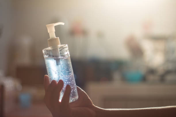 istock sanitizer alcohol in man hand 1216294242
