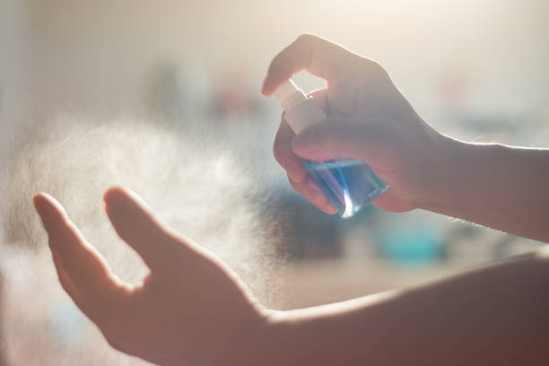 istock sanitizer alcohol in man hand 1216294252