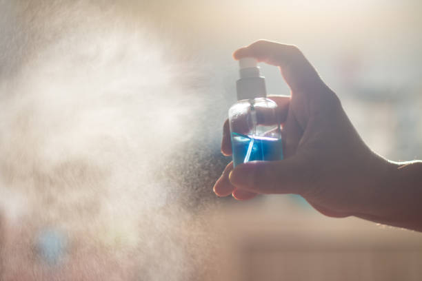 istock sanitizer alcohol in man hand 1216294258