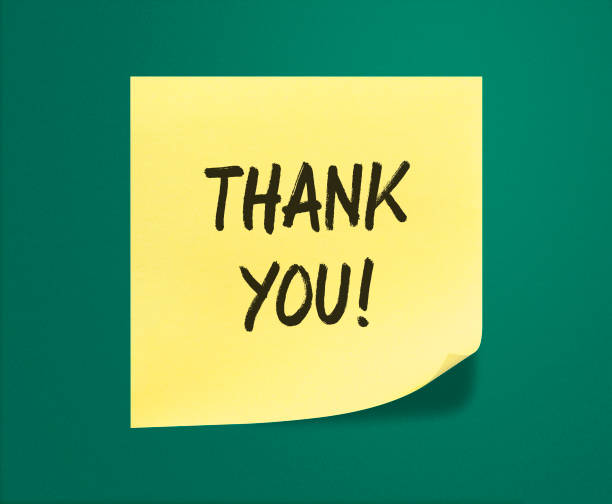 istock Thank You Sticky Note on green bakground 1216302887