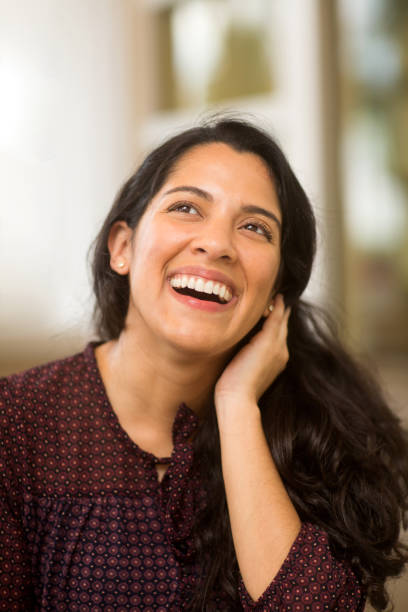 istock Young Hispanic woman smiling. 1216302928