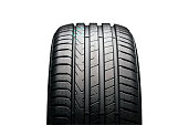 new summer tire on a black background, front view. isolate on a white background