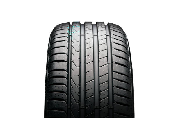 new summer tire on a black background, front view. isolate on a white background stock photo