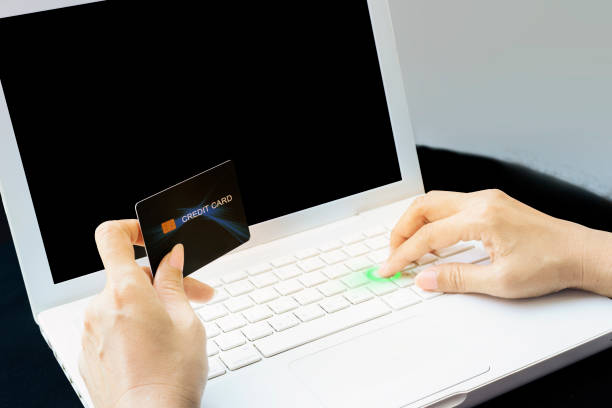 istock E-commerce and modern technology, holding credit card, making payment 1216309695