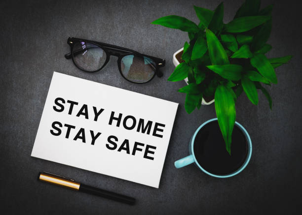 istock Stay home stay safe written on a white board 1216309726