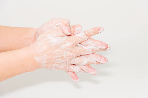 istock A man washes his hands with soapy water 1216312040