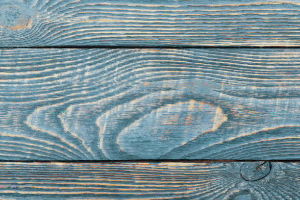 istock Light blue wood plank surface texture, wooden board background with copy space. 1216318531