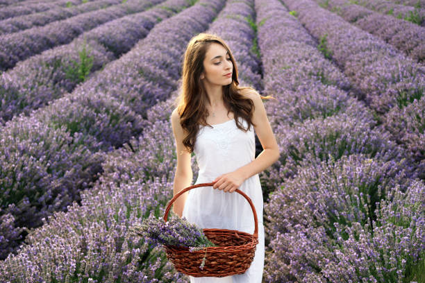 istock Young girl in lavender field 1216319329