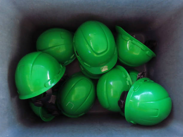istock Safety Construction Worker Hats. Teamwork of the construction team must have quality. Whether it is engineering, construction workers. Have a helmet to wear at work. For safety at work. 1216319344