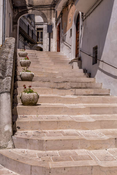 istock Narrow streets and stairs lined with white houses 1216320554