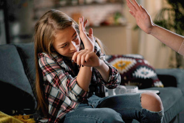 istock Mother slapping her daughter. 1216323673
