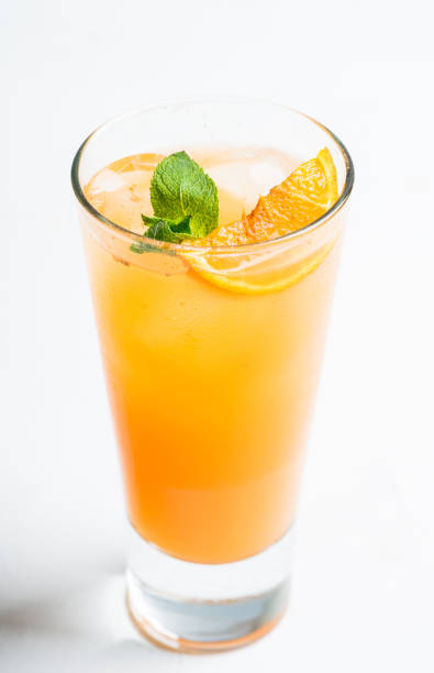 istock Fresh cocktail with vodka and orange juice on the rustic background 1216326861
